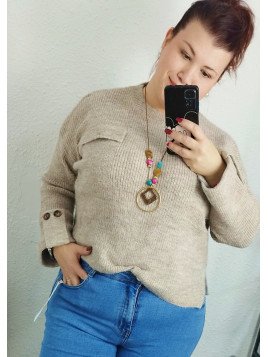 Jersey de punto beige con bolsillo.