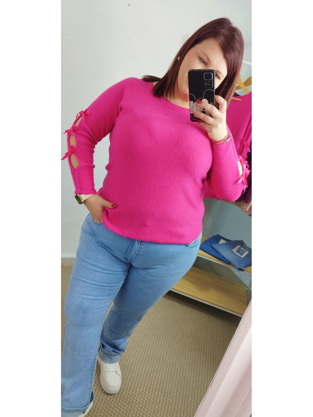 Jersey fucsia con lazadas en mangas