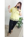 Camiseta amarilla con bajo de encaje