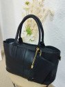 Bolso negro shopper  con bolso interior bandolera